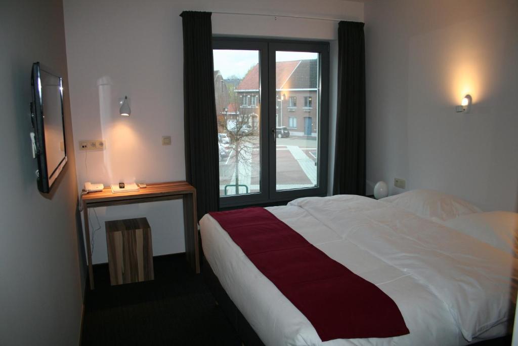 Hotel Carpinus Herent Стая снимка